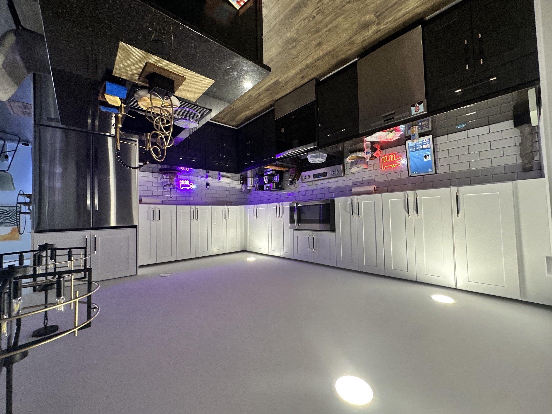 The Kitchen — subway tile, neon accents, gold bar cart